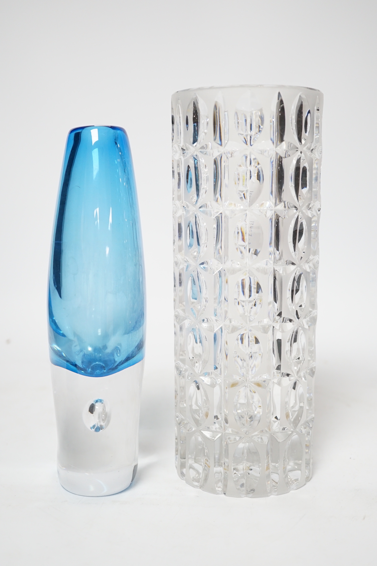 An Orrefors blue glass vase and a similar cut glass vase, tallest 24cm (2)